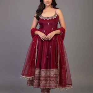 Elegant wine maroon embroidered salwar suit with net dupatta for wedding occasions.